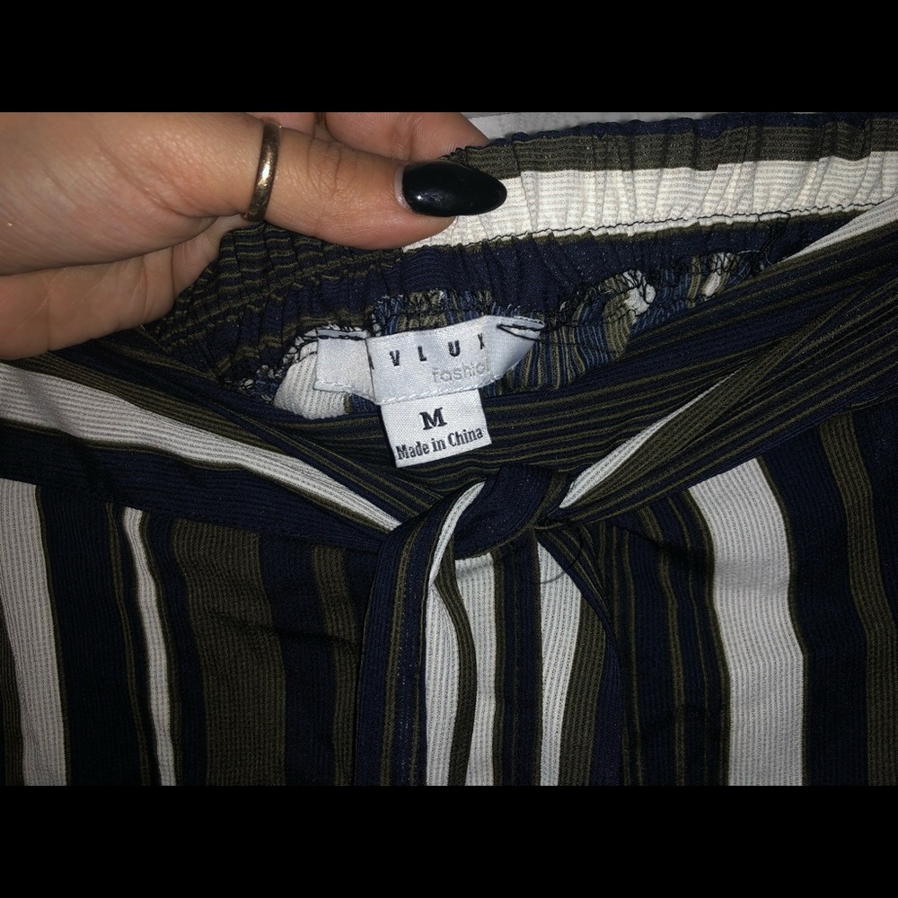 Beach pants, opened on the sides of the legs.